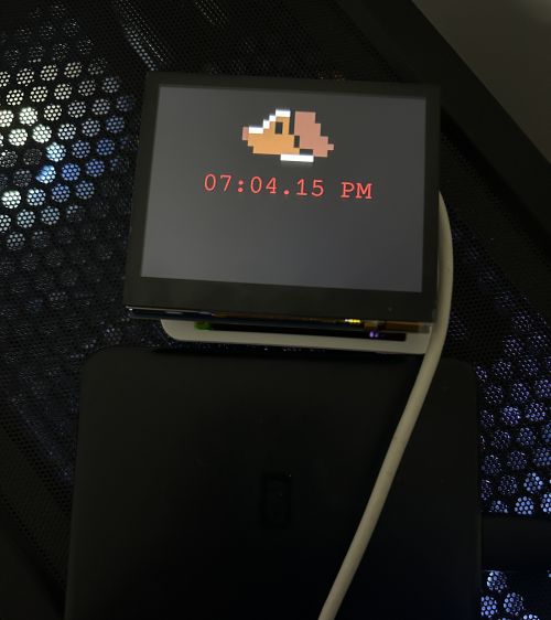 pi screen now has a static dog sprite above the clockface